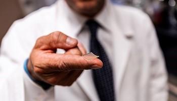 hand holding microneedle patch