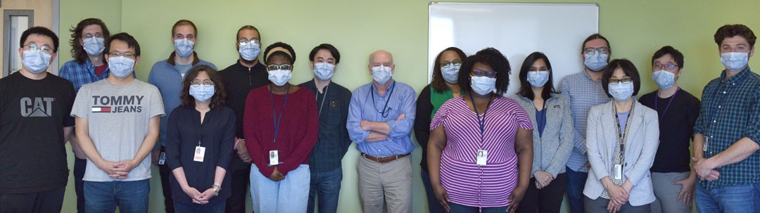 Group of scientists wearing masks