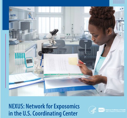 Woman in a research lab looking at papers