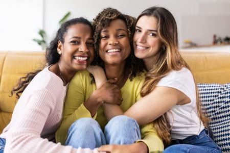 Photo of three women smiling