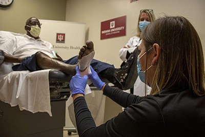 Photo of patient and doctor.