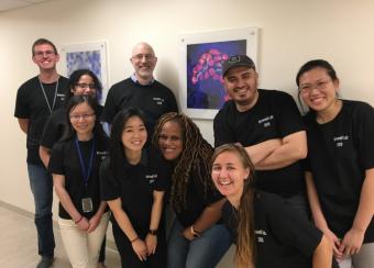 Brownell lab members posing in the hall.