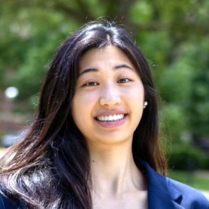 Headshot of a young woman with long dark hair.
