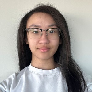 Headshot of a young woman with long hair.
