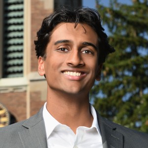 Headshot of a young man with short hair.