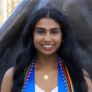 Headshot of a young woman with long, dark hair.