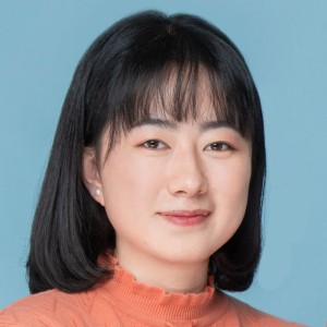Headshot of a young woman with dark hair