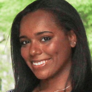 Headshot of a young woman with long dark hair. 