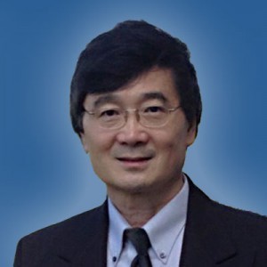 Headshot of a man in office attire.