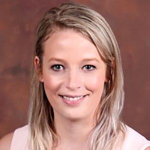 Headshot of a young woman with long blonde hair.