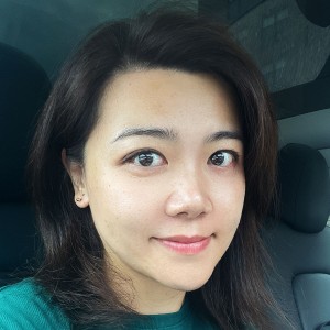 Headshot of a young woman with dark hair