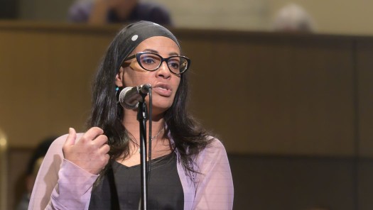 Photo of a woman asking a question.