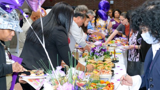 A large table spread of food.