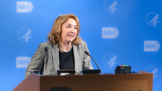 Photo of a woman at a lectern