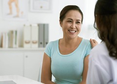 Photo of woman and doctor