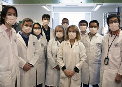 group of masked researchers in Dr. Kaplan's lab