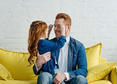 Man and girl with red hair