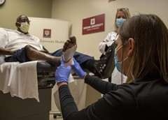 Photo of patient and doctor.